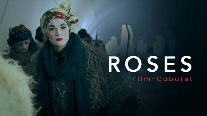 A female Ukrainian cabaret star with her face painted white with a head scarf for Roses Film-Cabaret